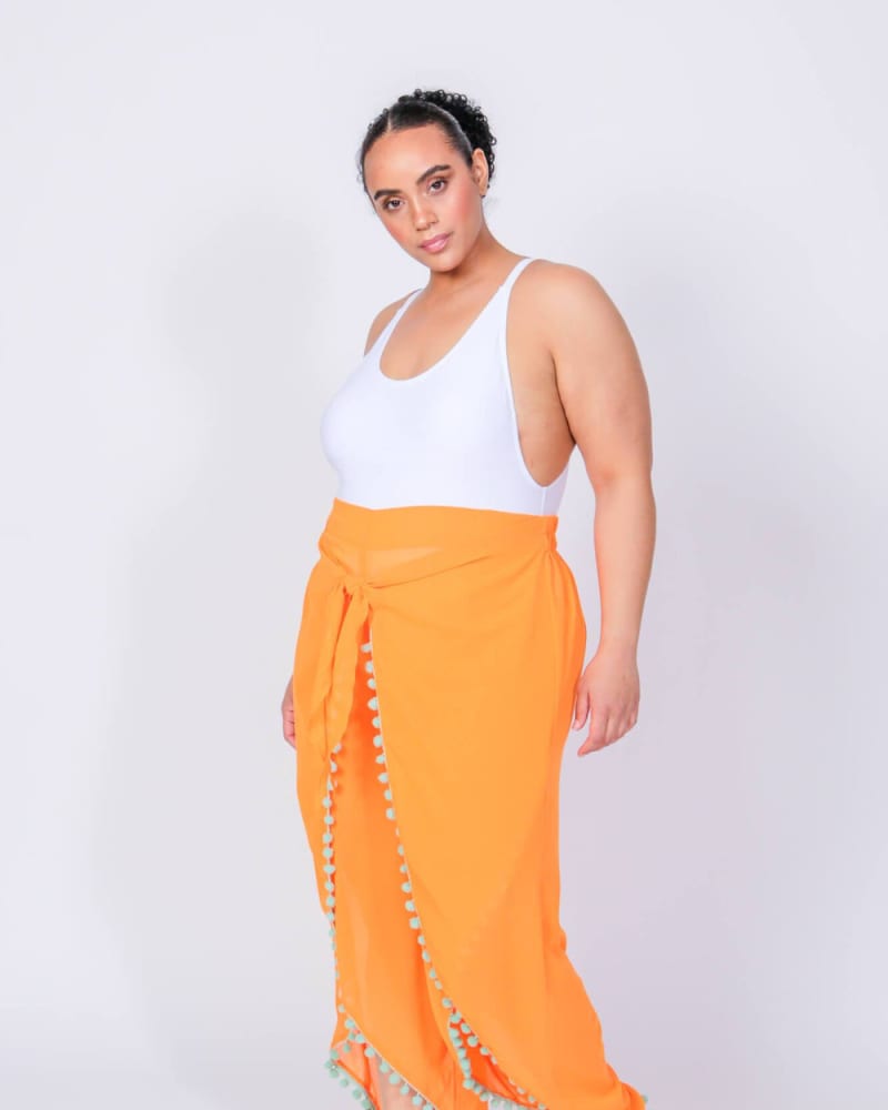 Front of a model wearing a size L Earth Sheer Wide-Leg Pants in Vermillion Orange by LuvMeMore. | dia_product_style_image_id:266711